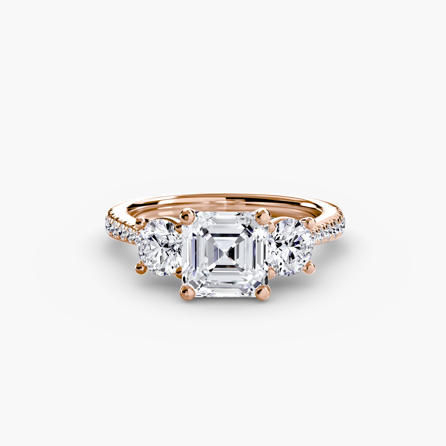 Dazzling Three-Stone diamond ring with Pavé Band
