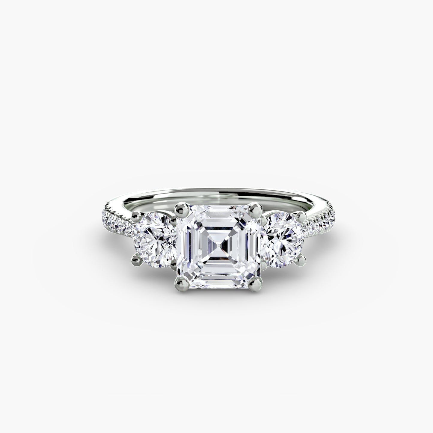 Dazzling Three-Stone diamond ring with Pavé Band