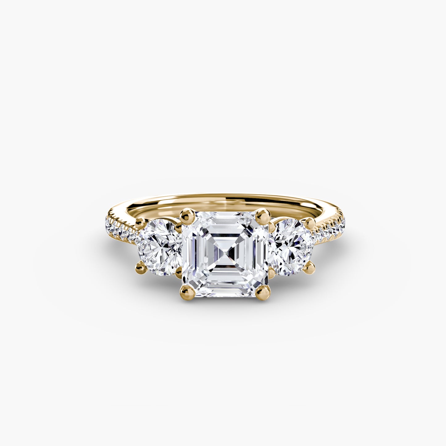 Dazzling Three-Stone diamond ring with Pavé Band