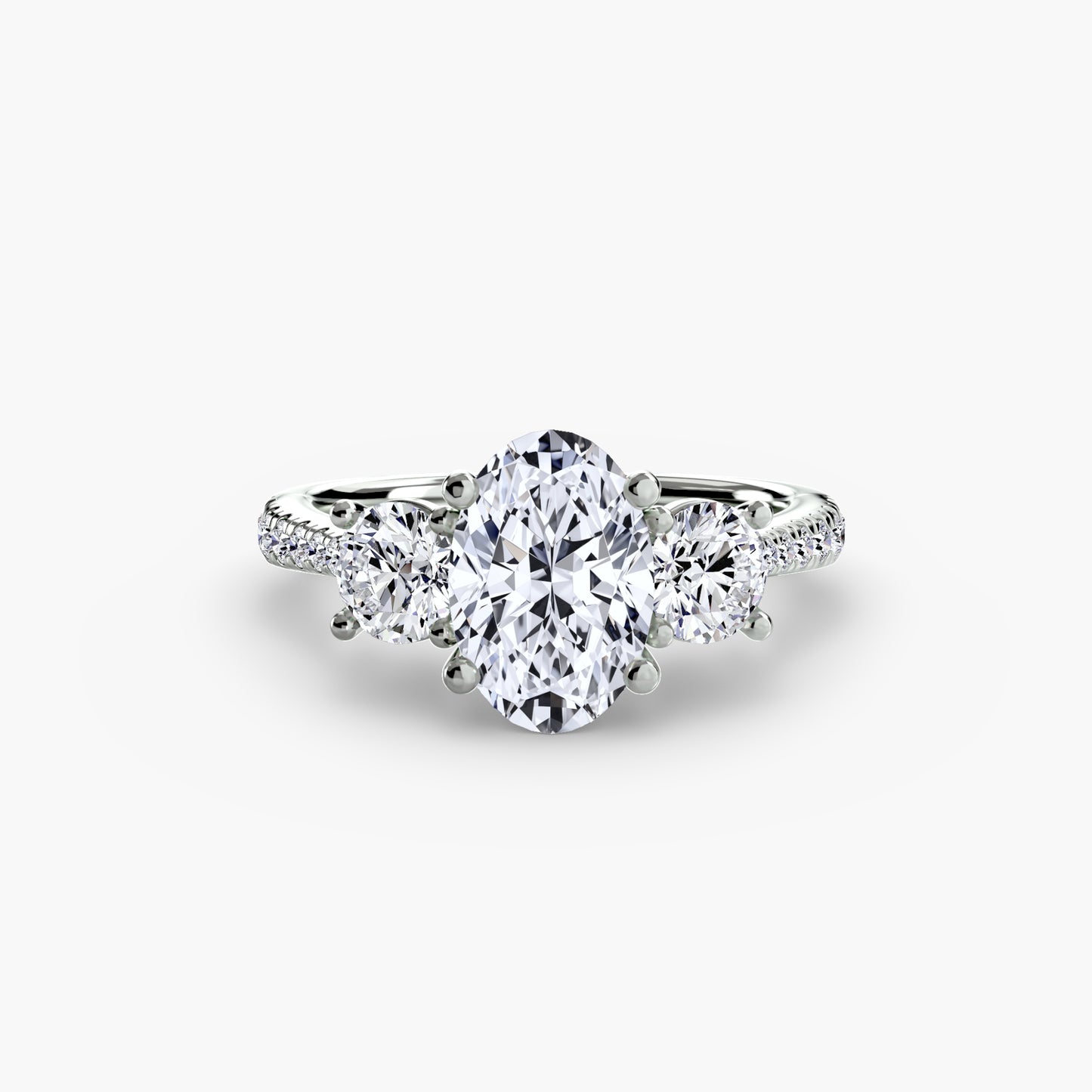 Dazzling Three-Stone diamond ring with Pavé Band