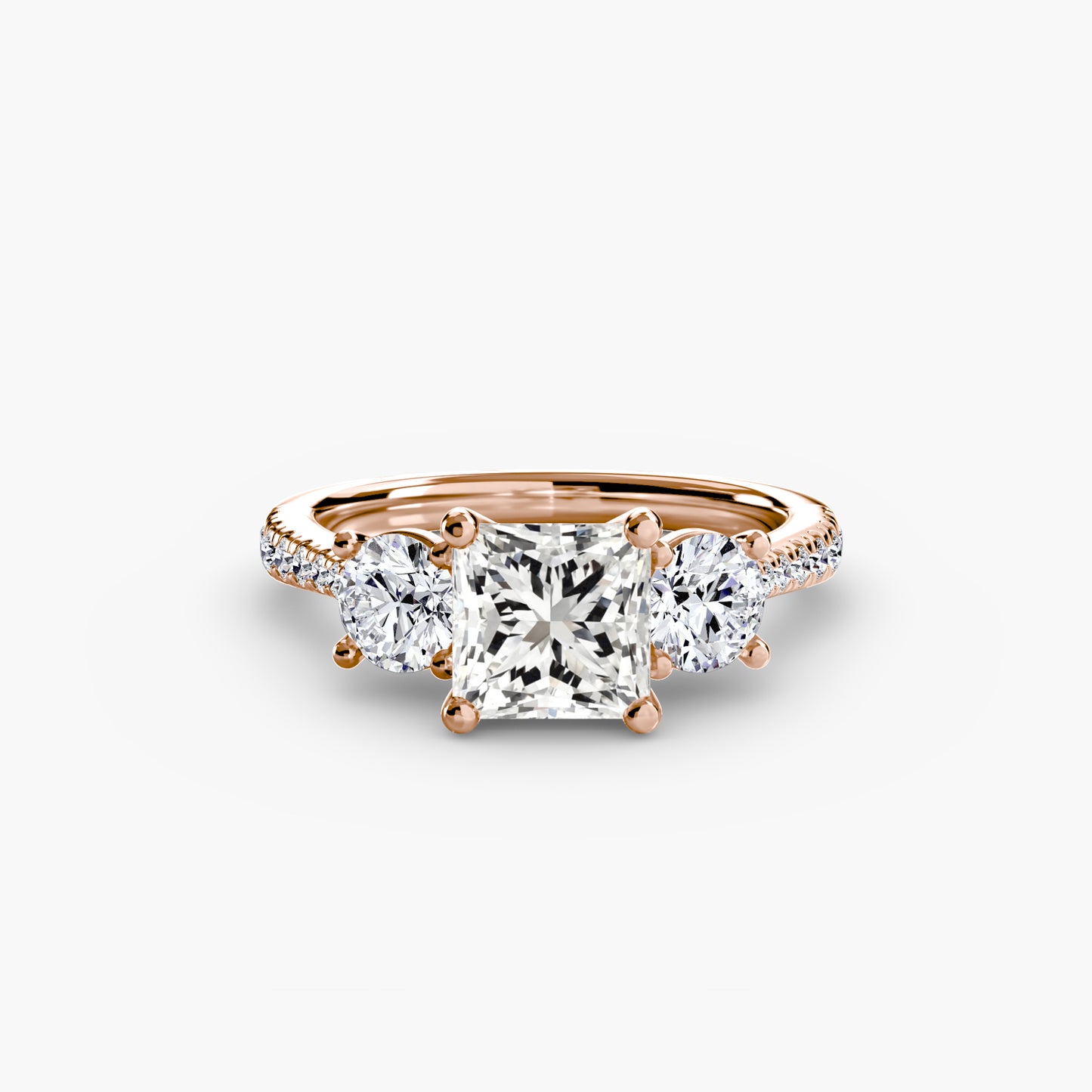 Dazzling Three-Stone diamond ring with Pavé Band