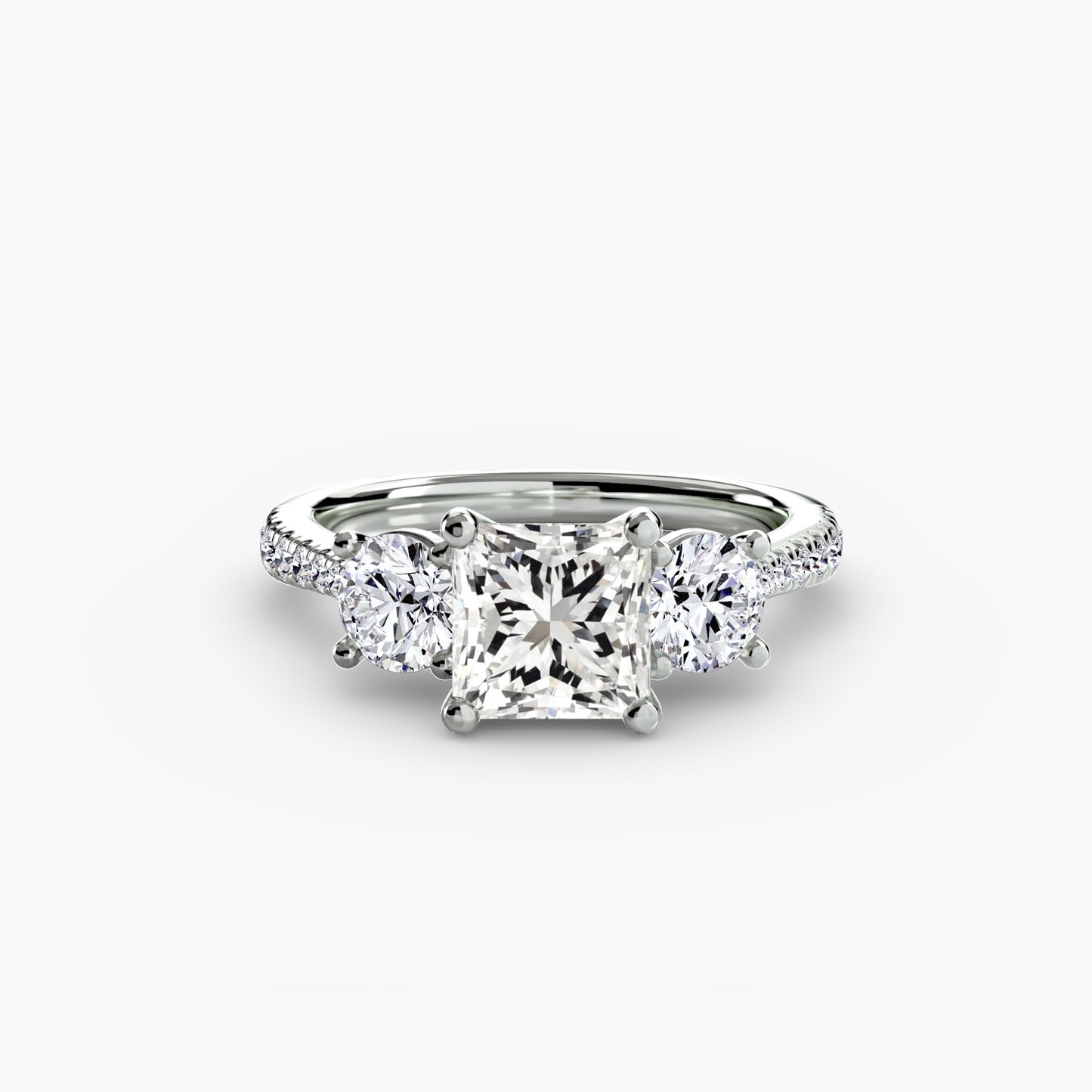 Dazzling Three-Stone diamond ring with Pavé Band