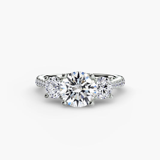 Dazzling Three-Stone diamond ring with Pavé Band