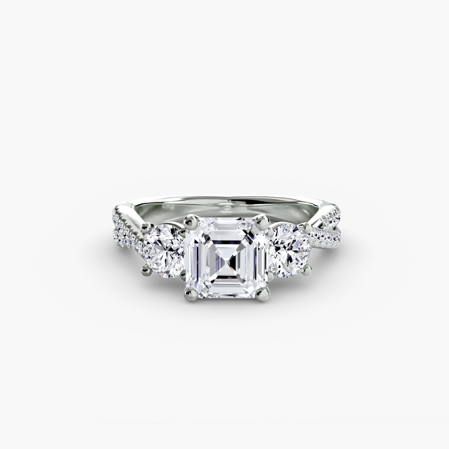 The Romantic Three-Stone Diamond ring with Pavé Band