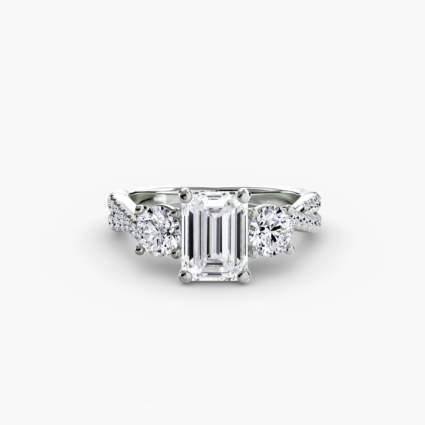 The Romantic Three-Stone Diamond ring with Pavé Band