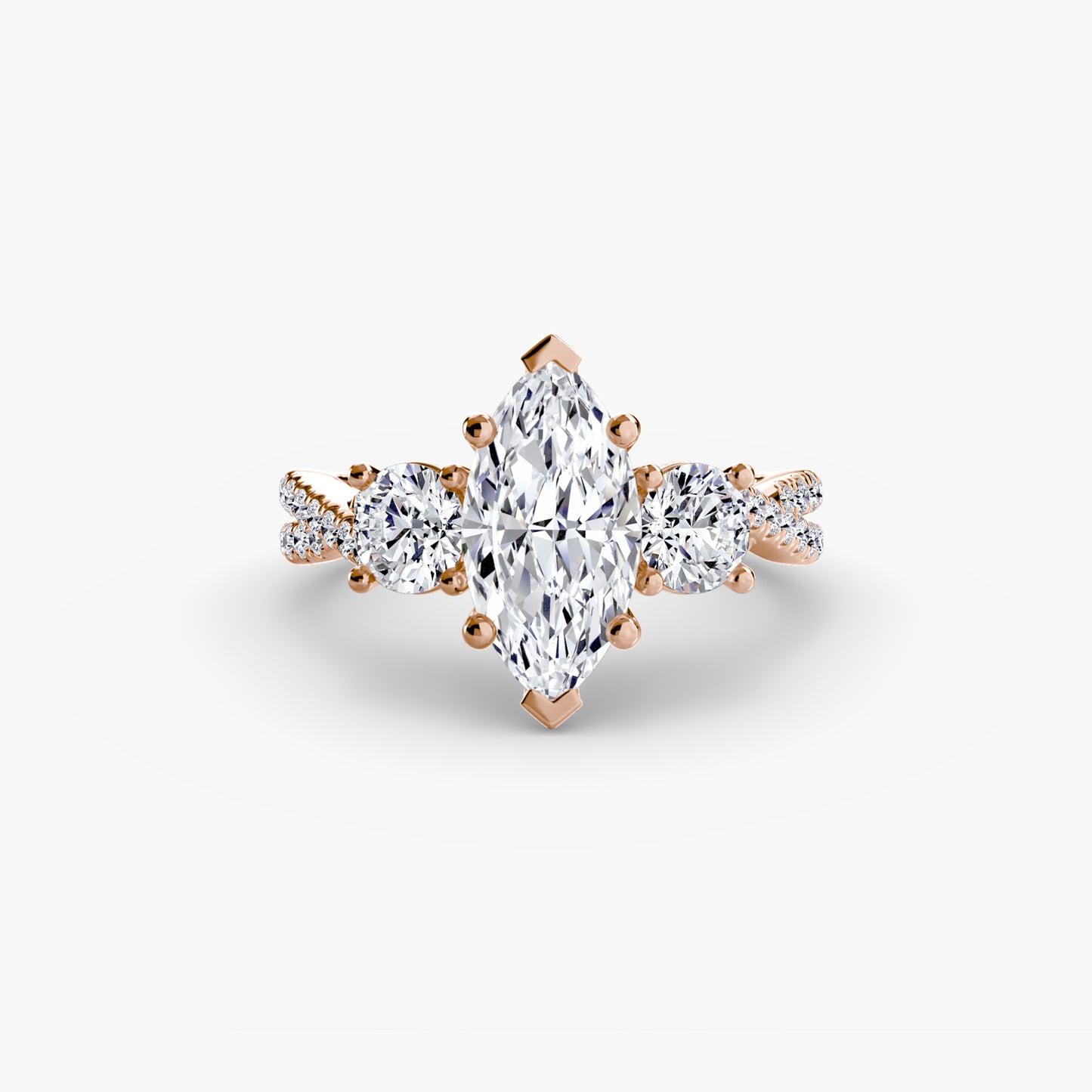 The Romantic Three-Stone Diamond ring with Pavé Band