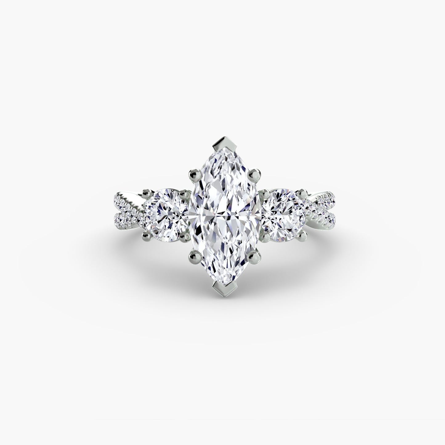The Romantic Three-Stone Diamond ring with Pavé Band