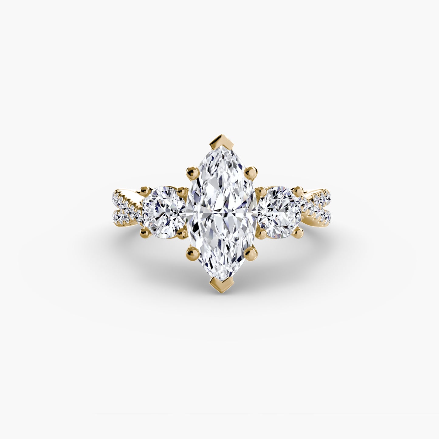 The Romantic Three-Stone Diamond ring with Pavé Band