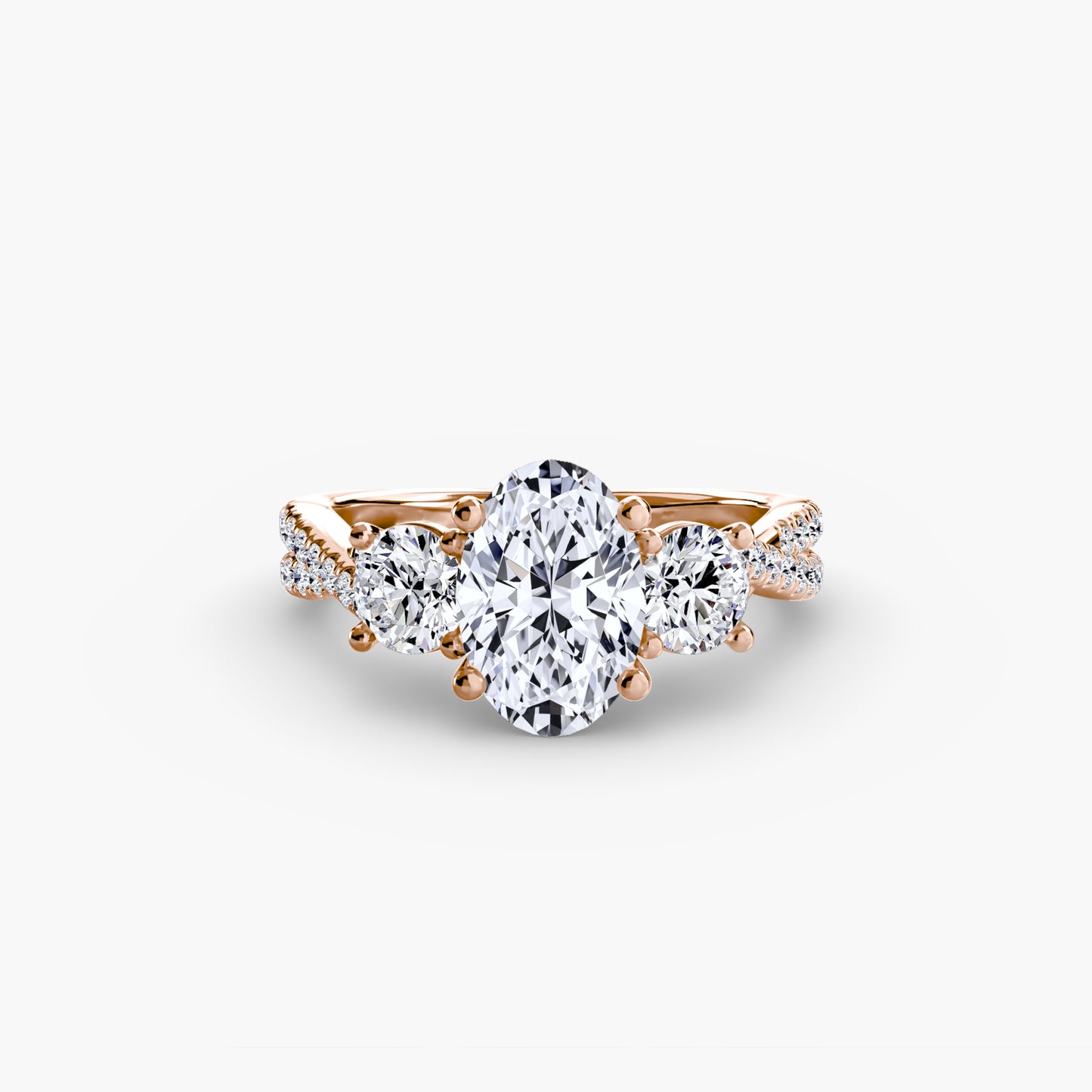 The Romantic Three-Stone Diamond ring with Pavé Band
