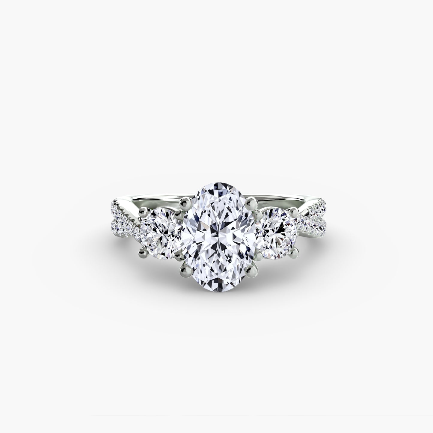 The Romantic Three-Stone Diamond ring with Pavé Band