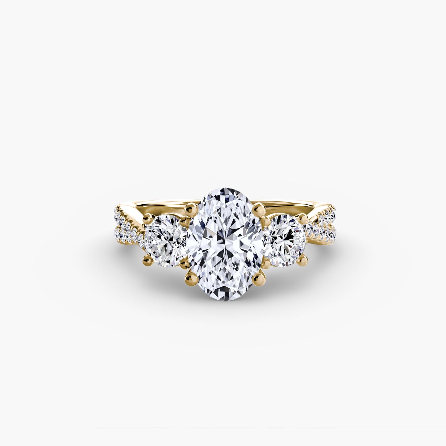 The Romantic Three-Stone Diamond ring with Pavé Band