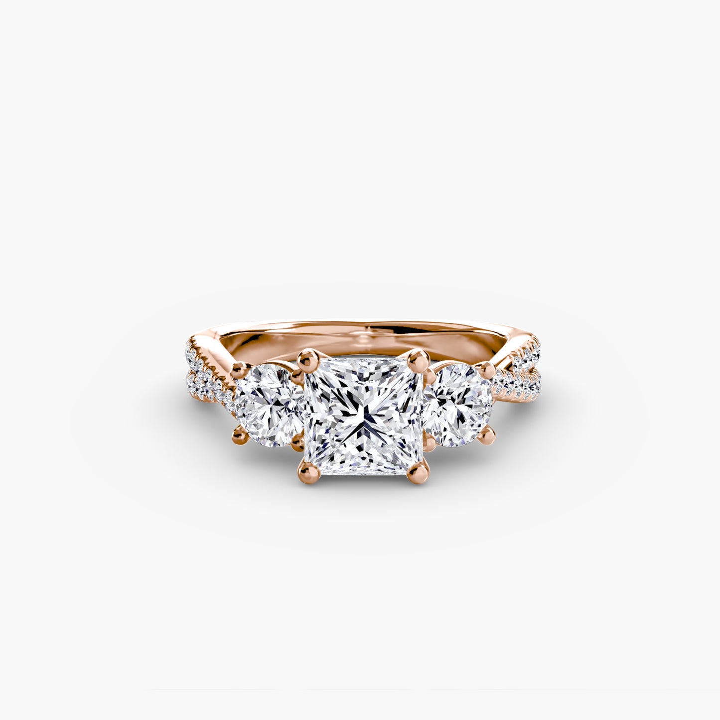 The Romantic Three-Stone Diamond ring with Pavé Band