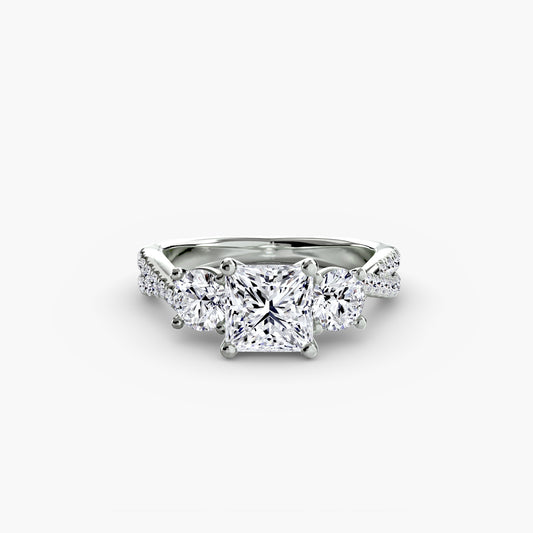 The Romantic Three-Stone Diamond ring with Pavé Band