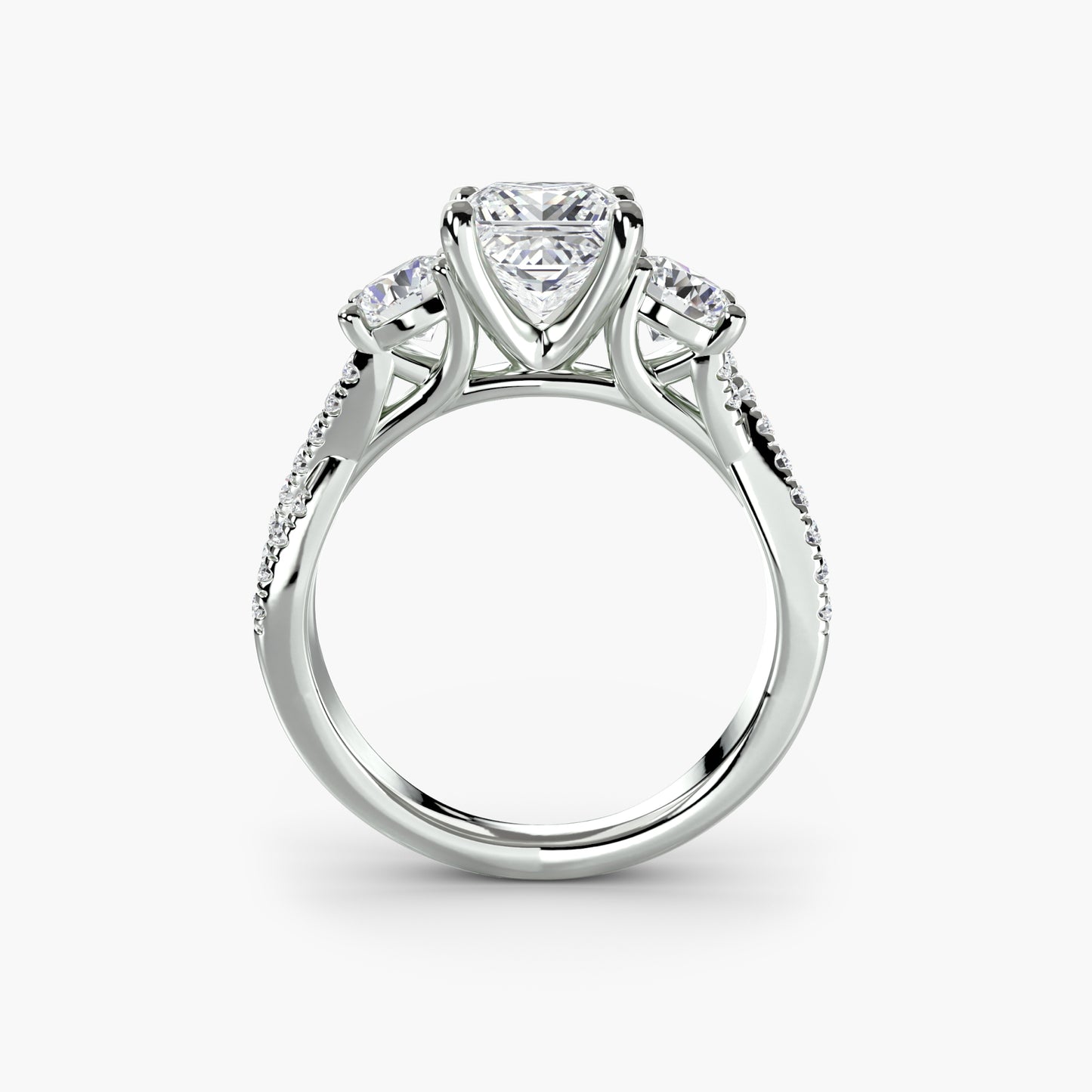 The Romantic Three-Stone Diamond ring with Pavé Band