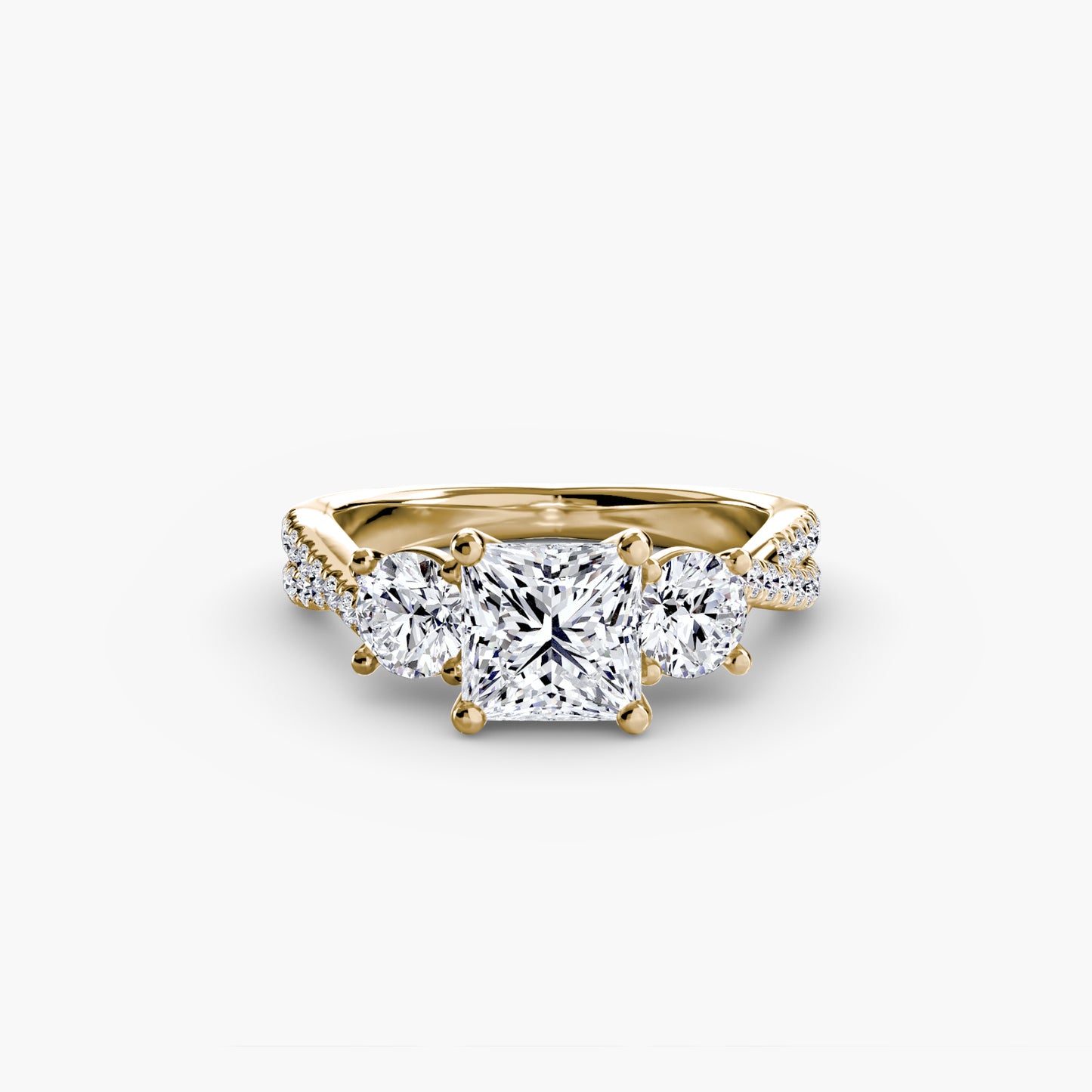 The Romantic Three-Stone Diamond ring with Pavé Band