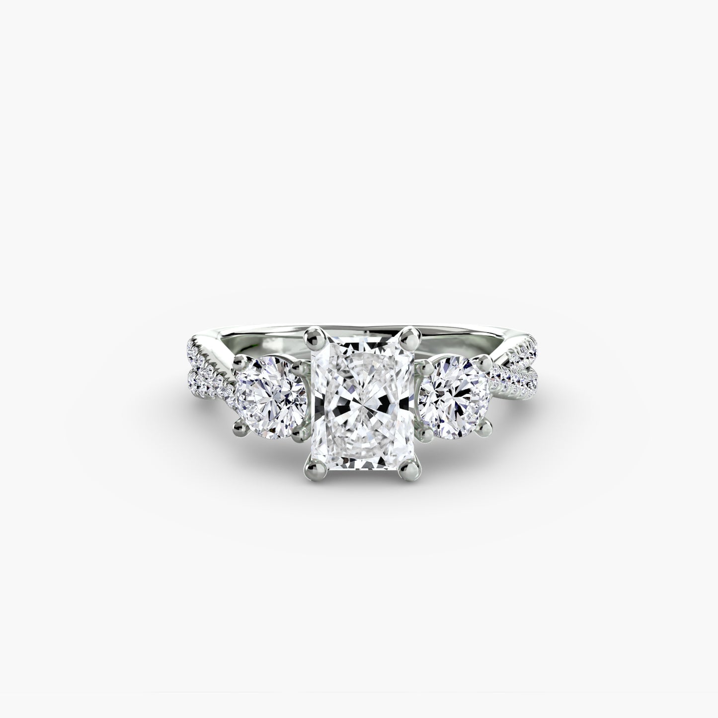 The Romantic Three-Stone Diamond ring with Pavé Band