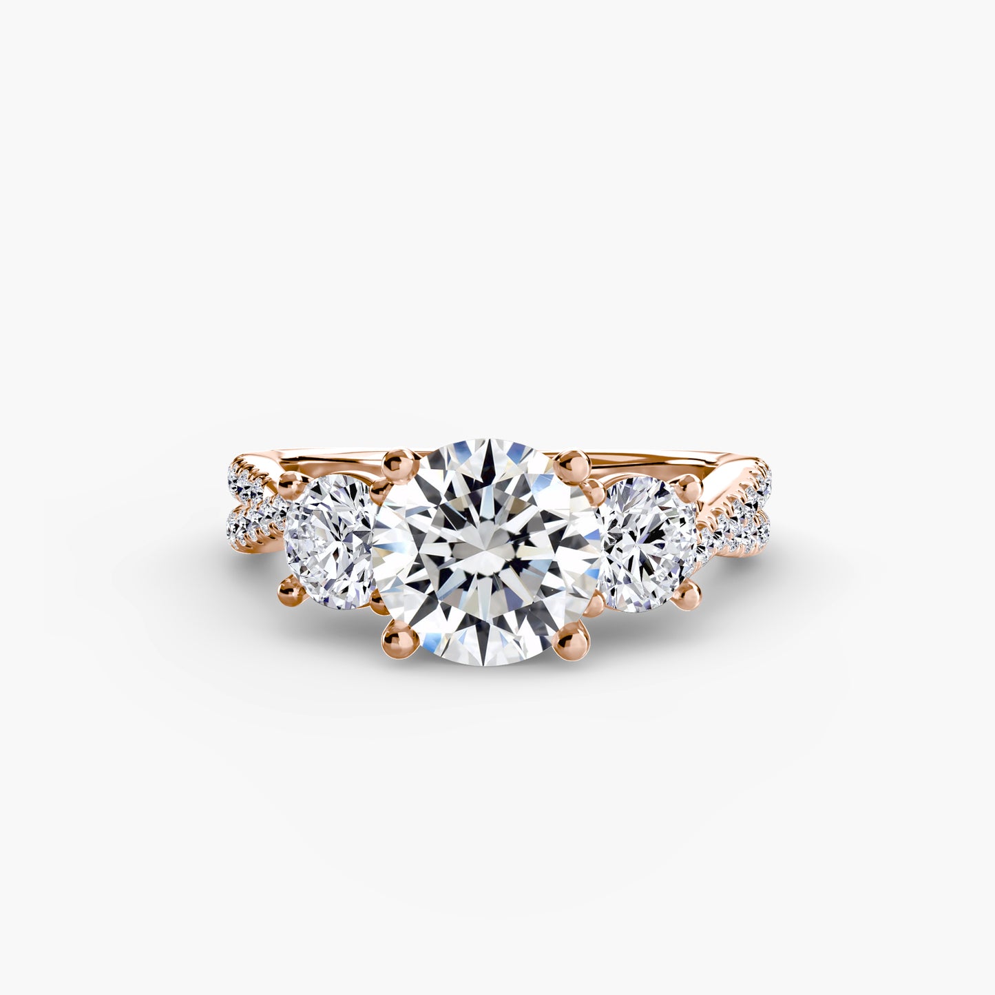 The Romantic Three-Stone Diamond ring with Pavé Band