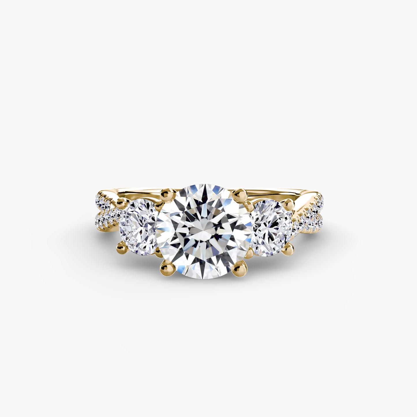 The Romantic Three-Stone Diamond ring with Pavé Band