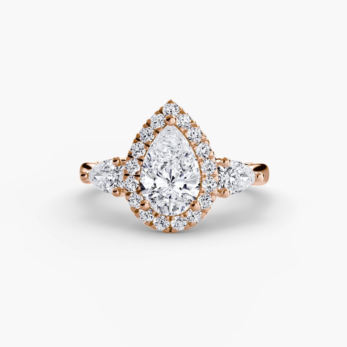Elysian Three-Stone Ring pear shape diamond with Halo | Joaillerie VCL