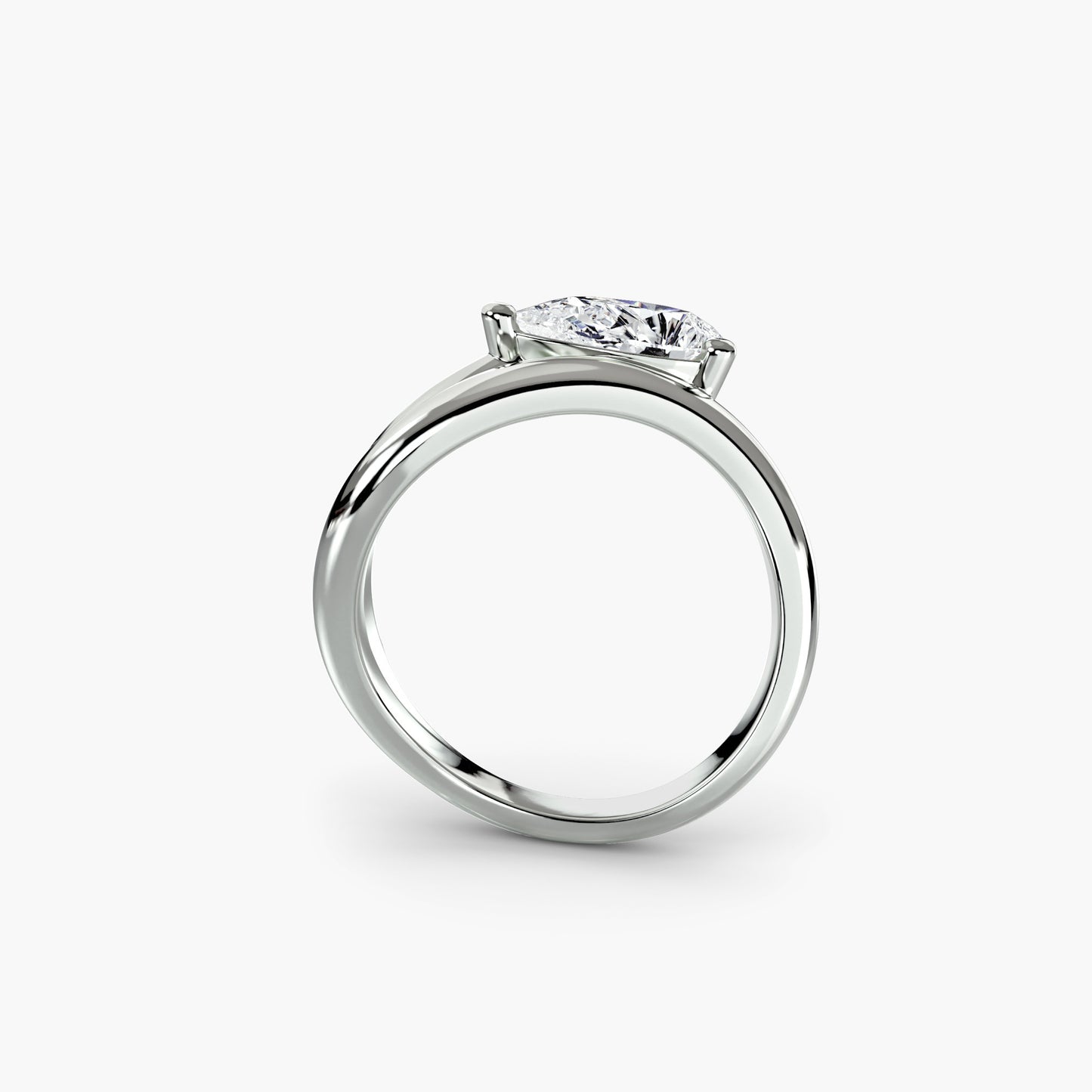 The Wave Ring with pear shape diamond double assymetrical band