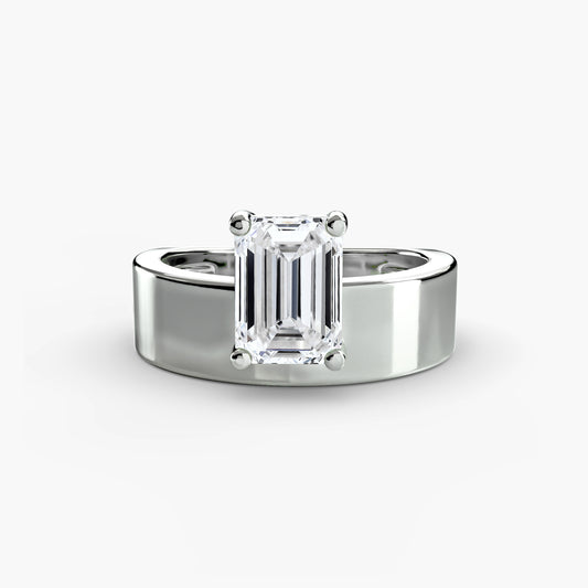 Wide Band Solitaire with emerald cut diamond