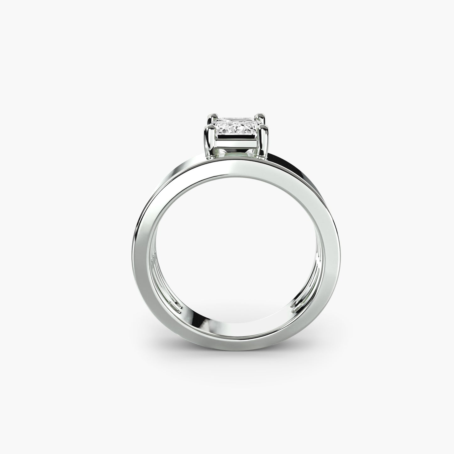 Wide Band Solitaire with emerald cut diamond