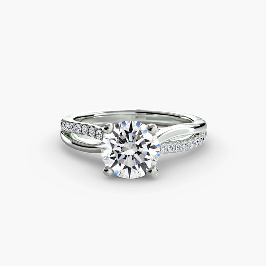 The Split Shank asymmetrical diamond Pavé Solitaire
