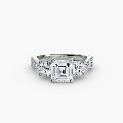 The Romantic Three-Stone Diamond ring with Pavé Band