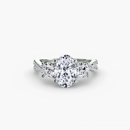 The Romantic Three-Stone Diamond ring with Pavé Band