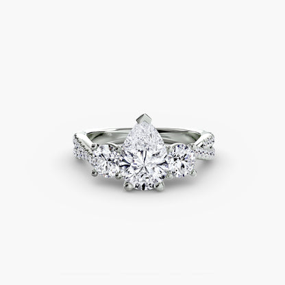 The Romantic Three-Stone Diamond ring with Pavé Band