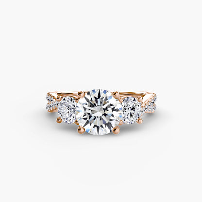 The Romantic Three-Stone Diamond ring with Pavé Band
