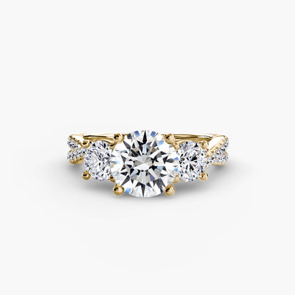 The Romantic Three-Stone Diamond ring with Pavé Band
