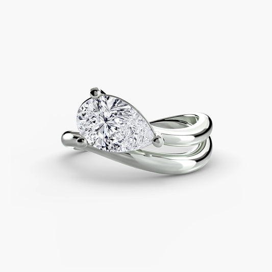 The Wave Ring with pear shape diamond double assymetrical band