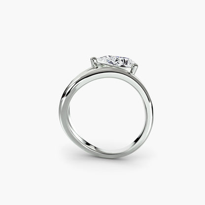 The Wave Ring with pear shape diamond double assymetrical band