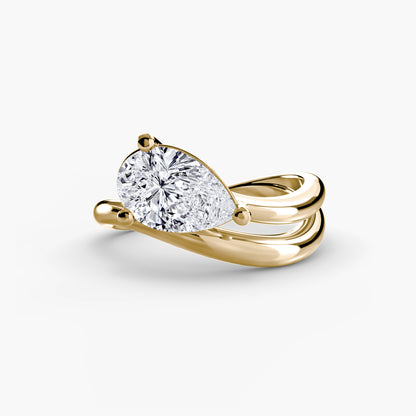 The Wave Ring with pear shape diamond double assymetrical band