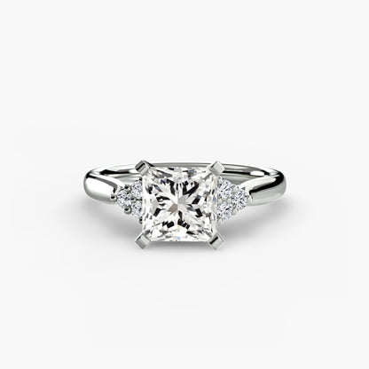 Solitaire with diamond Cluster Shoulders