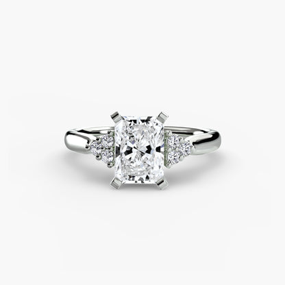 Solitaire with diamond Cluster Shoulders